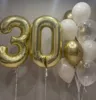 Фонтан из 10 воздушных шаров с цифрами “Золотой юбилей»